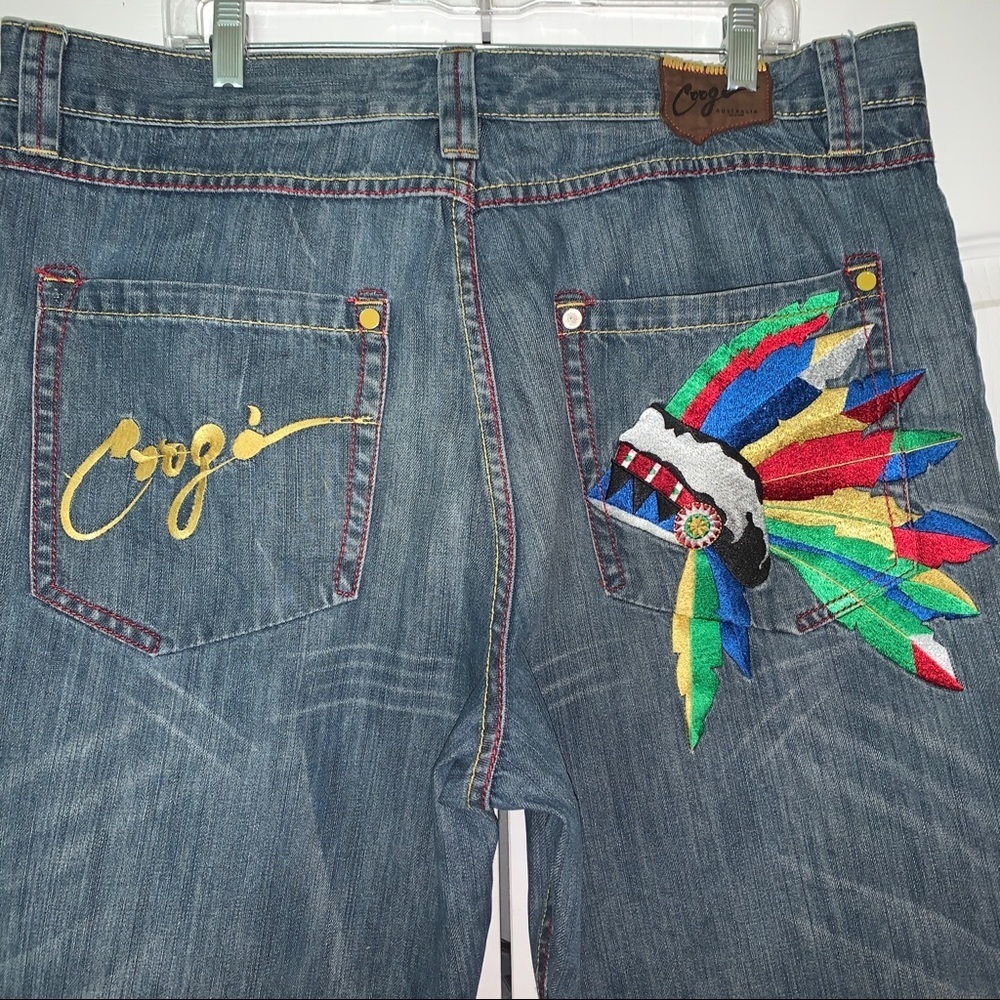 Coogi Indian headdress denim jeans